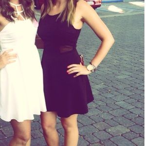 Super sexy, black fit and flare dress with zipper